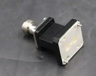 How does the End Launch Double Ridged WG To Coaxial Adapter achieve high-frequency signal conversion?